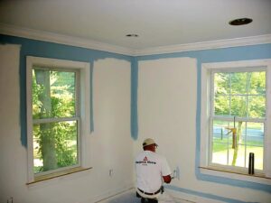 Affordable painter handling trim and wall touch-ups